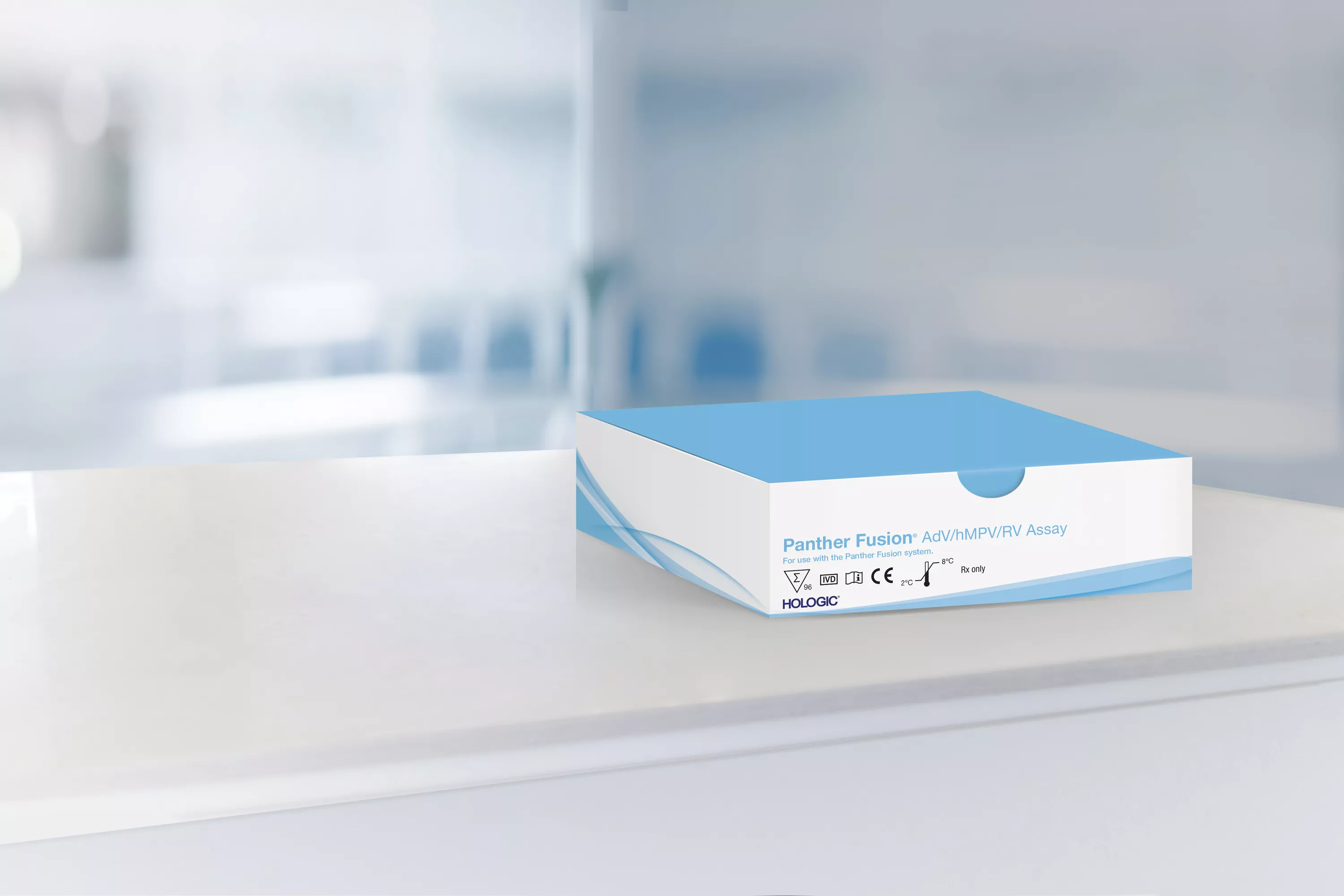 Caja de un ensayo con un laboratorio al fondo