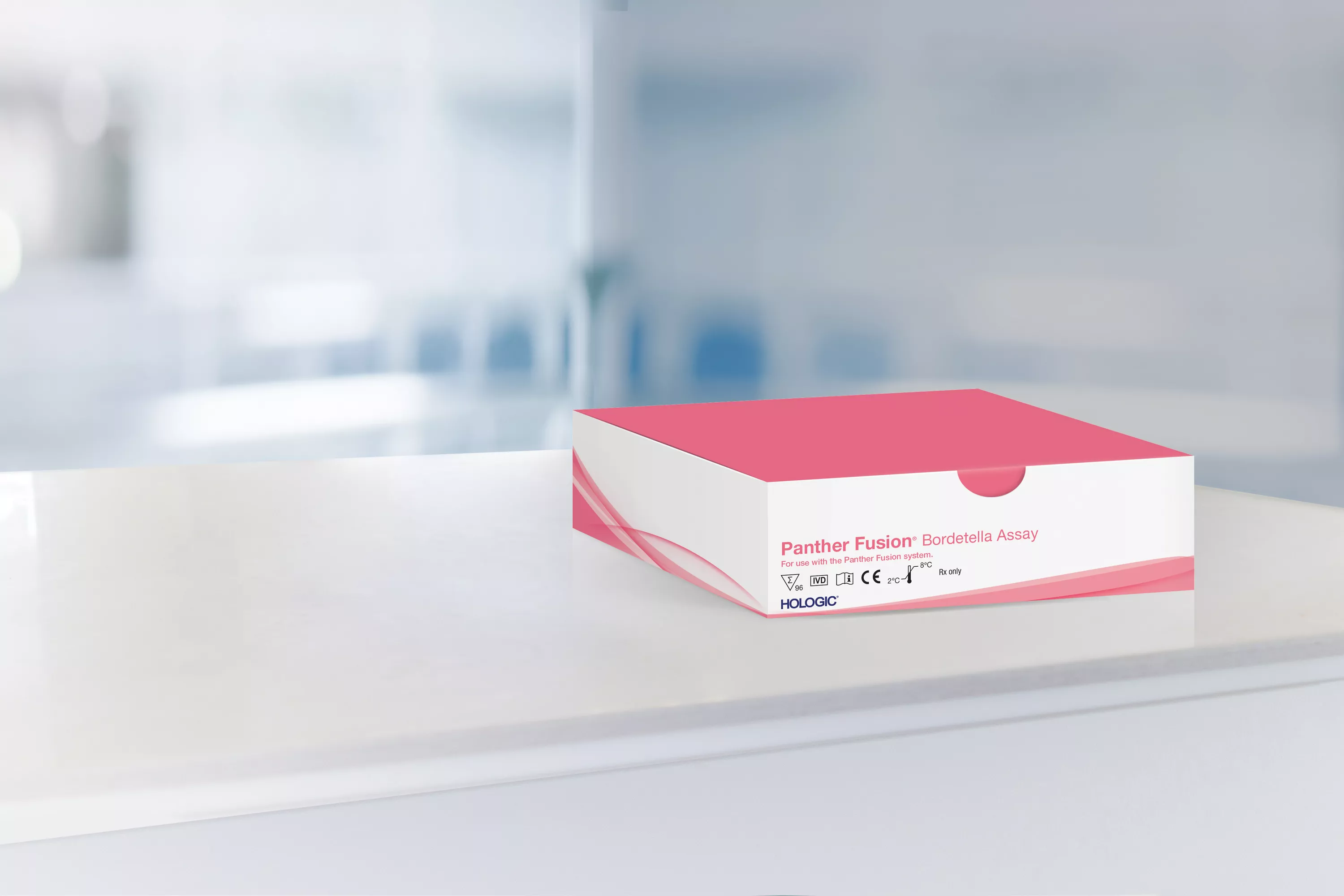 Caja de un ensayo con un laboratorio al fondo