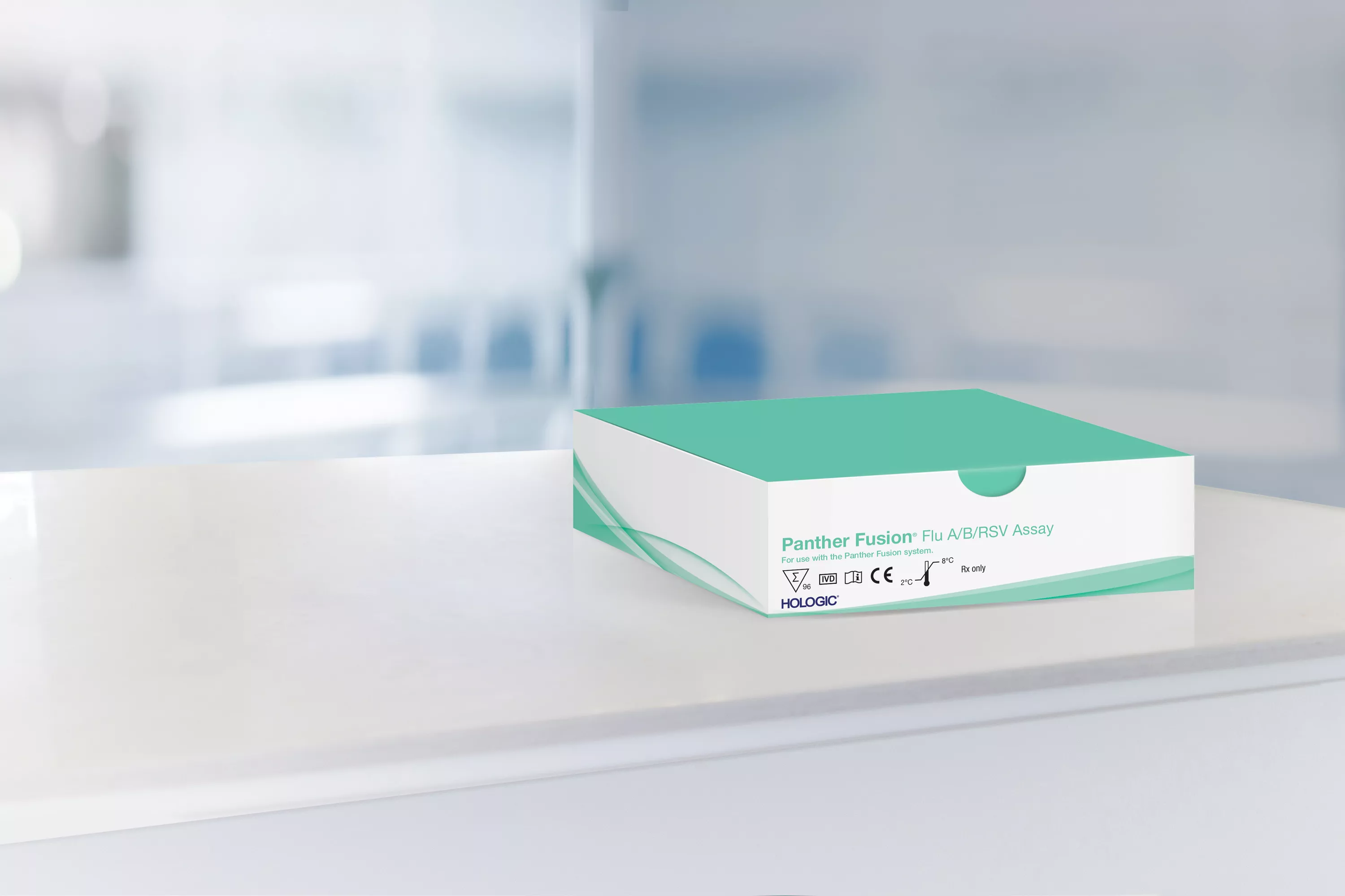 Caja de un ensayo con un laboratorio al fondo