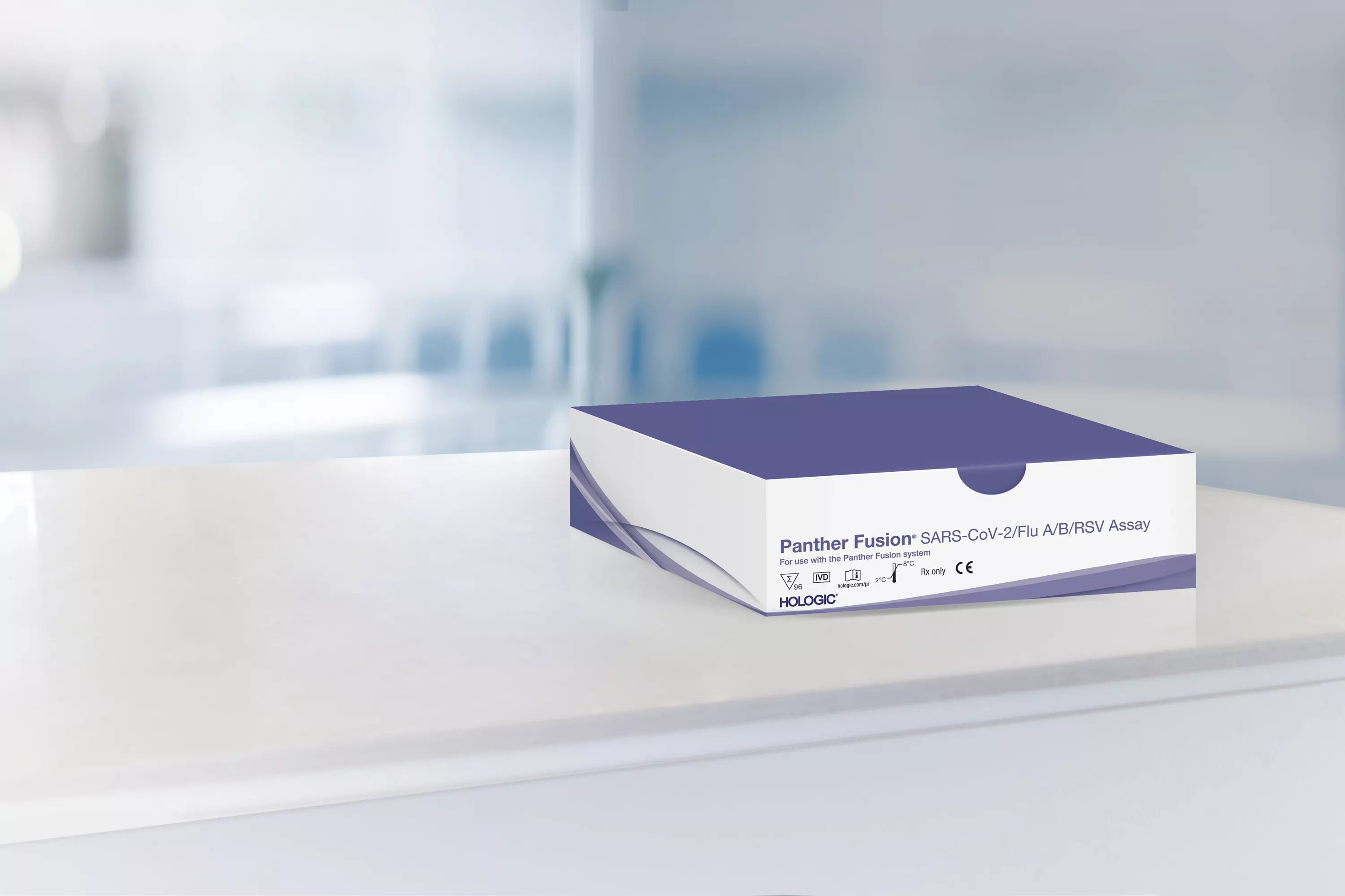 Caja de un ensayo con un laboratorio al fondo