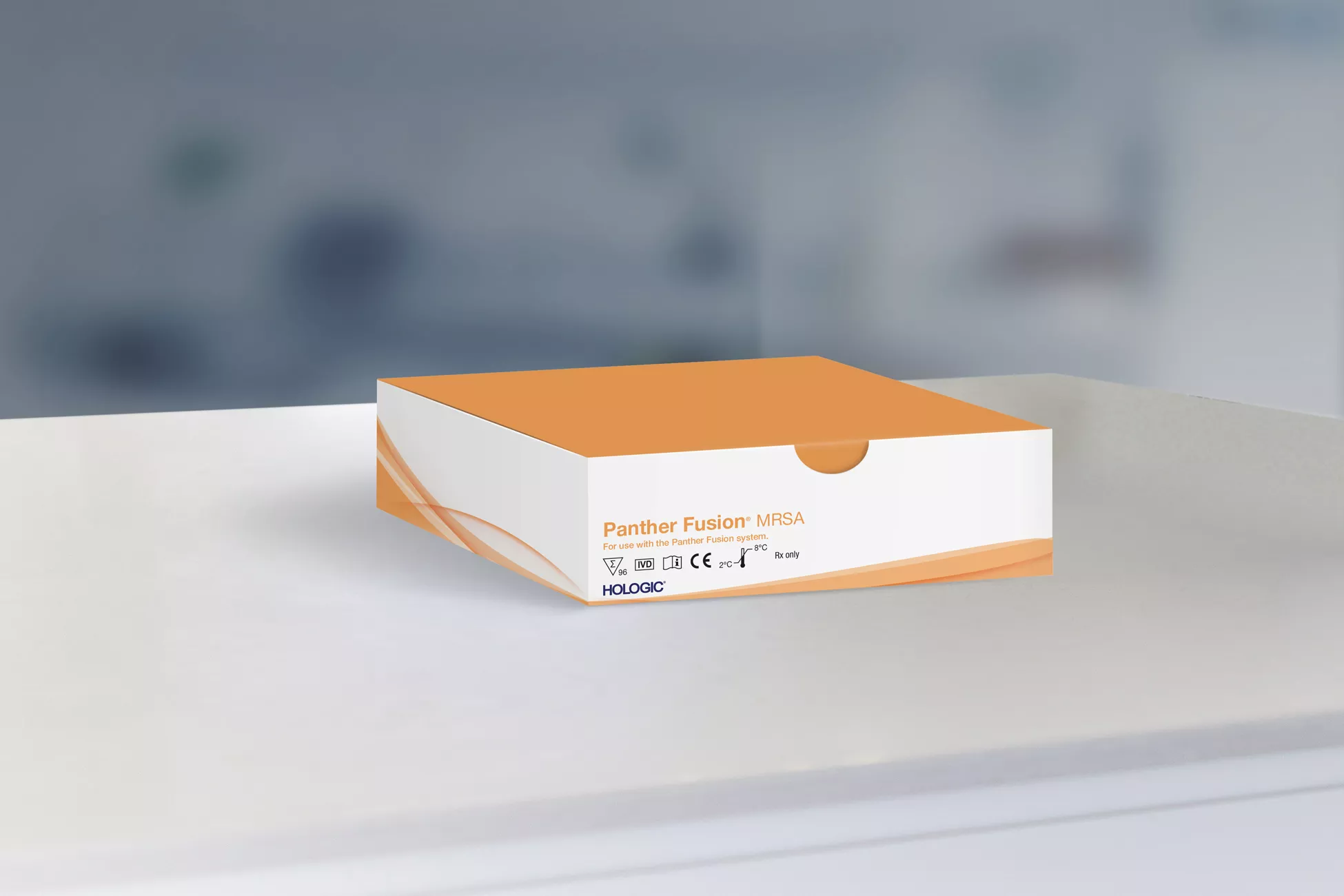 Caja de un ensayo con un laboratorio al fondo